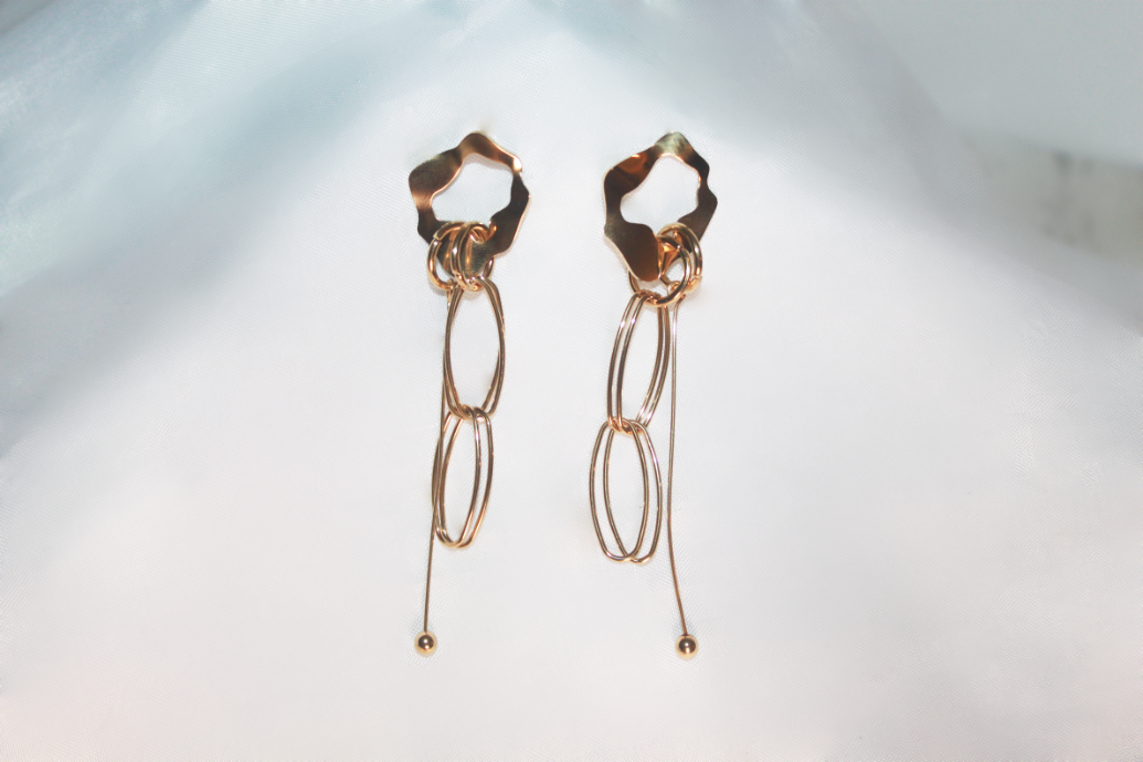 MARIE CURIE Golden earrings with dangling rings